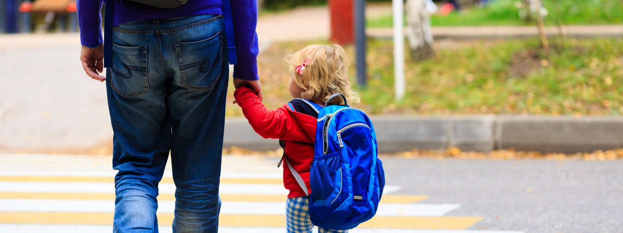 Child walking to preschool